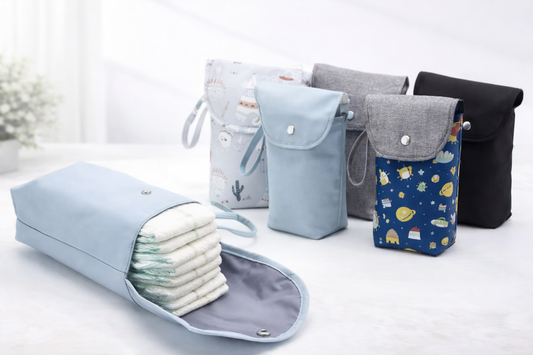 תיק טיטולים קומפקטי מוגן מים –  חיתולים תמיד מסודרים ונגישים